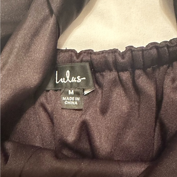 Lulus Alluring Mood Black Satin Halter Side-Tie Skort Romper - Picture 3 of 5